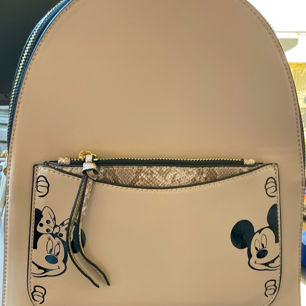 Domani backpack in cream or black.  Embellishment can be added, your preference!